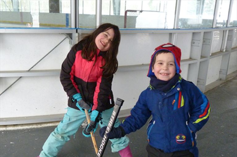 Two kids skating