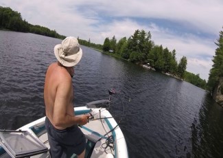 Man on boat fishing
