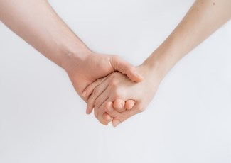 image of holding hands