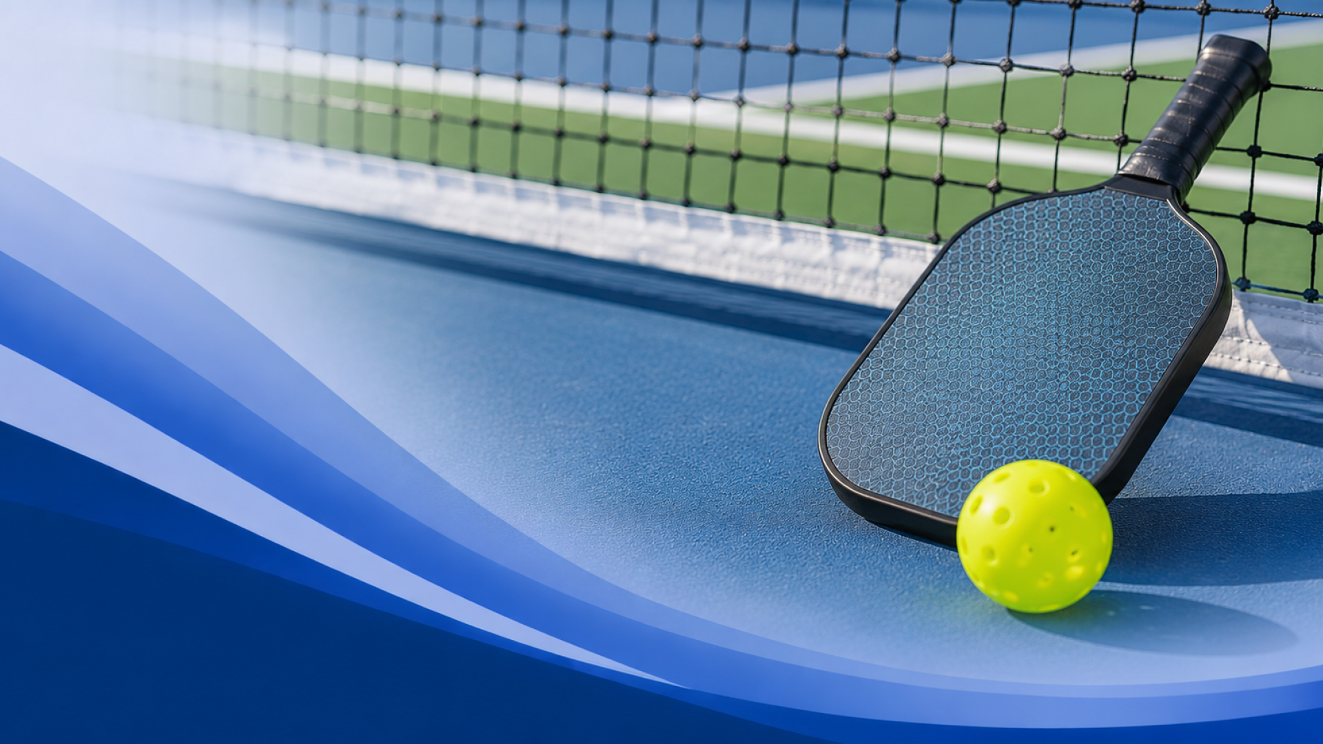 Pickleball court with paddle and ball