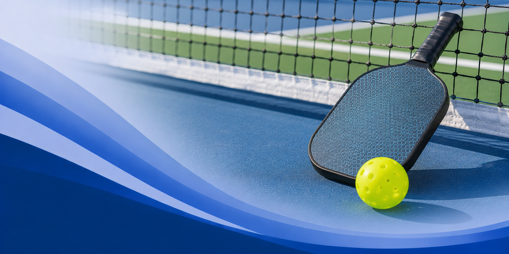 Pickleball court with paddle and ball